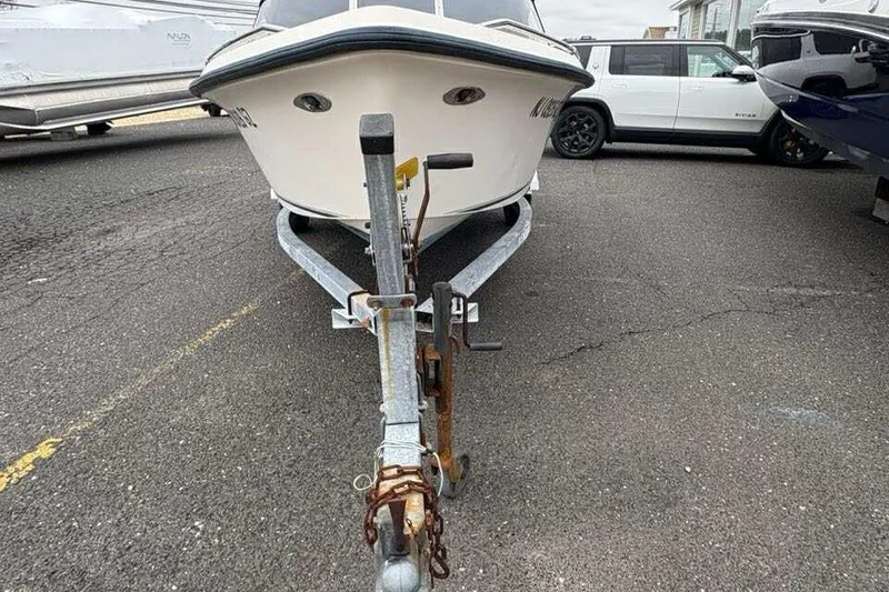 Slide: The Image of 2006 Key West 1720 Dual Console boat on trailer in parking lot. - 7