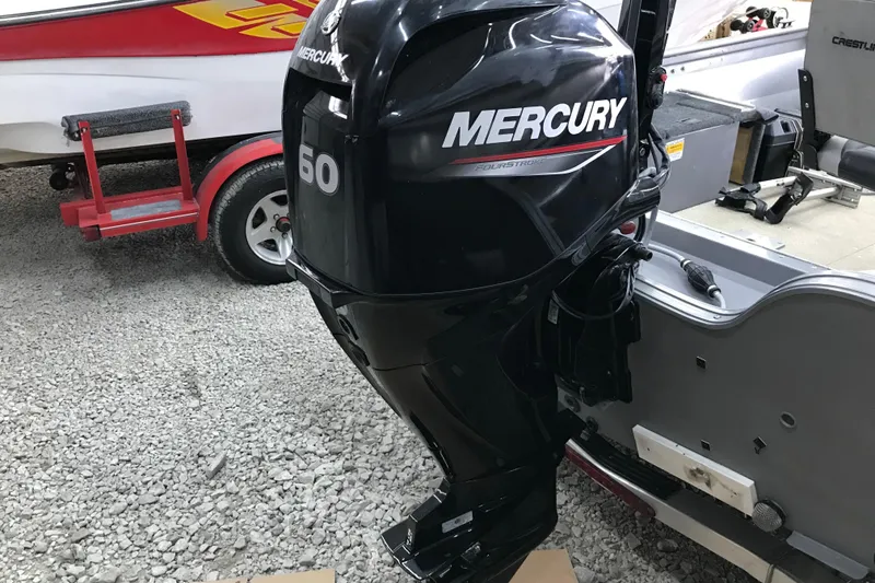 Slide: The Image of 2004 Crestliner Canadian 18 Tiller with Mercury 50HP outboard motor. - 5