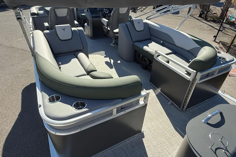 Slide: The Image of 2026 Tahoe Pontoon LTZ Quad Lounger with spacious seating and modern design. - 5