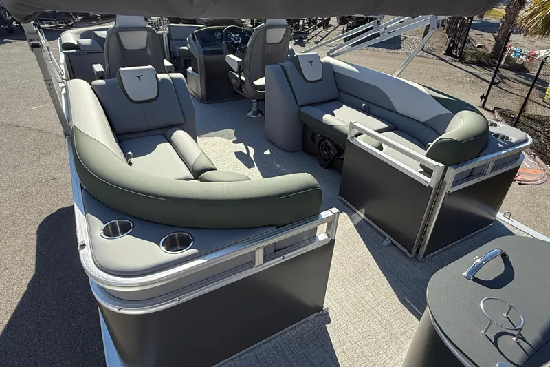 Slide: The Image of 2026 Tahoe Pontoon LTZ Quad Lounger with spacious seating and modern design. - 6