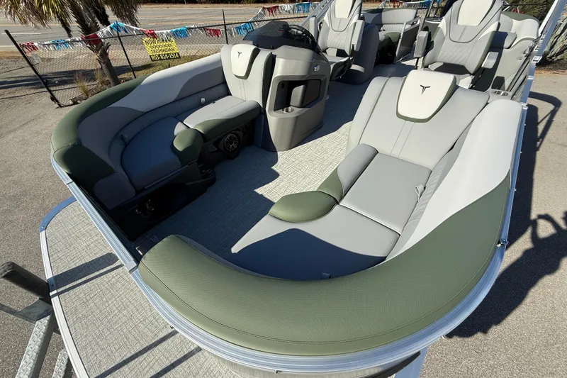 Slide: The Image of 2026 Tahoe Pontoon LTZ Quad Lounger with luxurious seating and modern design. - 9