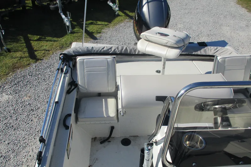 Slide: The Image of 2018 Ranger RB190 Bay boat interior with seating and steering wheel. - 10