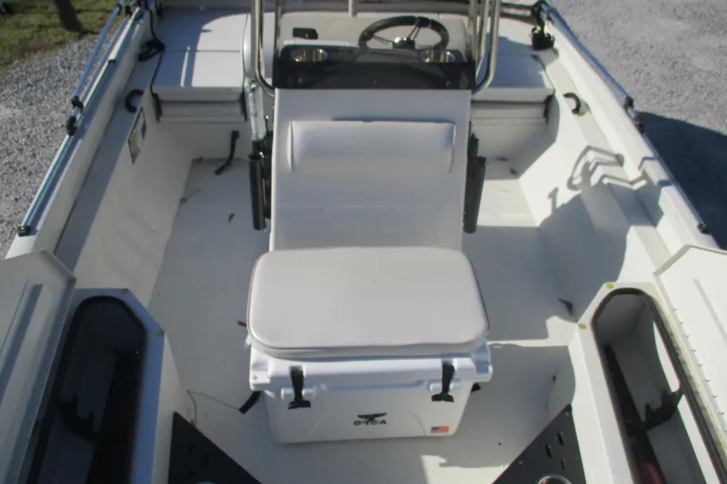 Slide: The Image of 2018 Ranger RB190 Bay boat interior with seating and steering console. - 14