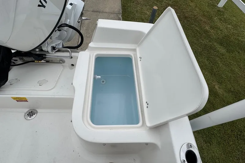 Slide: The Image of Open livewell on 2026 Key West 1720 Center Console boat, showcasing interior design. - 15