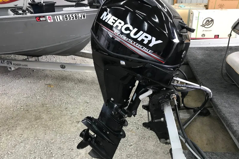 Slide: The Image of 1995 Alumacraft Lunker 165 LTD with Mercury FourStroke outboard motor on trailer. - 10