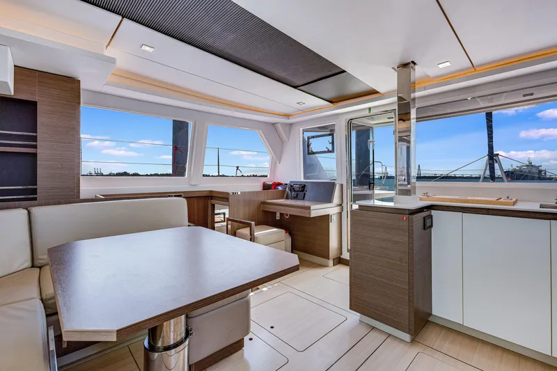 Slide: The Image of Luxurious interior of 2023 Leopard 42 yacht with modern furnishings and panoramic windows. - 13