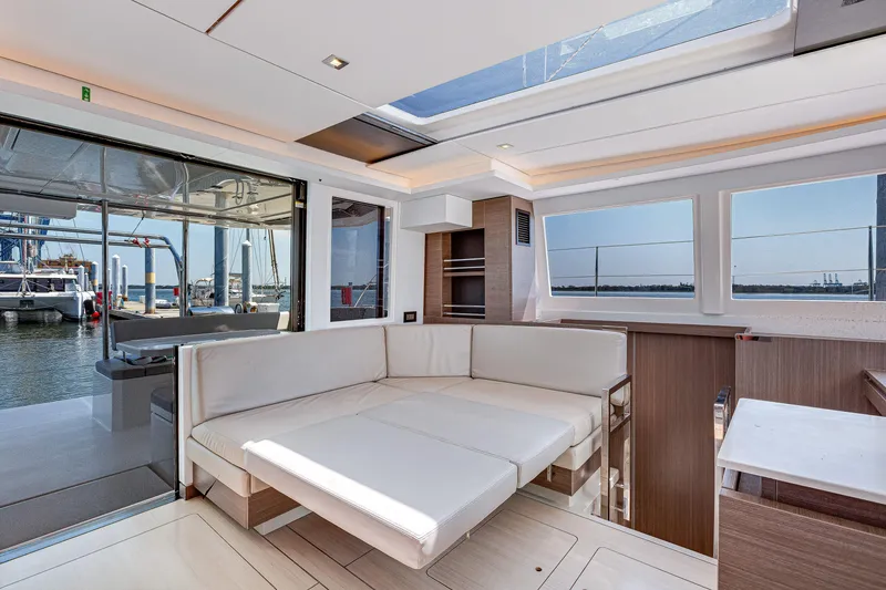 Slide: The Image of Luxurious interior of 2023 Leopard 42 yacht with modern seating and panoramic windows. - 14