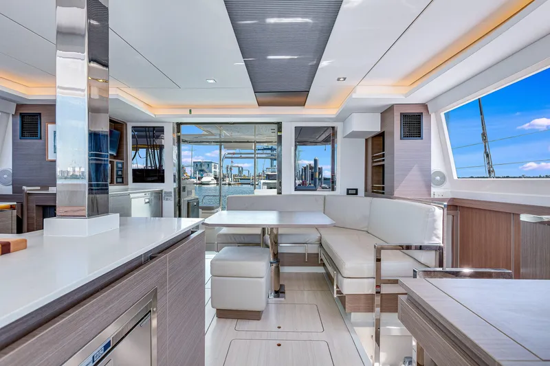 Slide: The Image of Luxurious interior of 2023 Leopard 42 yacht with modern seating and panoramic windows. - 15