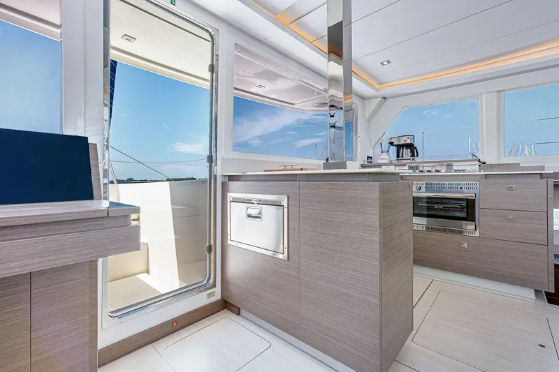 Slide: The Image of Modern kitchen interior of 2023 Leopard 42 yacht with sleek design and ocean view. - 16
