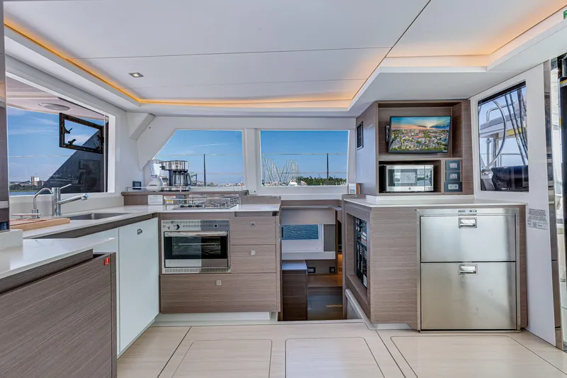 Slide: The Image of Modern kitchen interior of 2023 Leopard 42 yacht with sleek appliances and ocean view. - 18