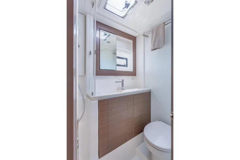 Slide: The Image of Modern bathroom in 2023 Leopard 42 yacht, featuring sleek design and compact functionality. - 24