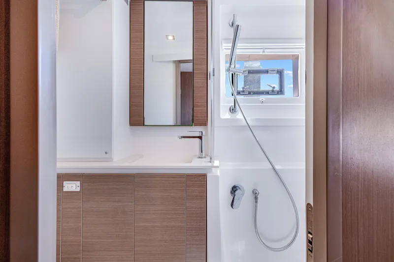 Slide: The Image of Modern bathroom in 2023 Leopard 42 yacht with sleek fixtures and wood accents. - 26