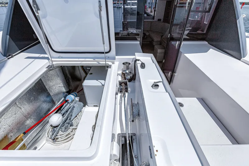 Slide: The Image of 2023 Leopard 42 yacht deck with open storage compartment and equipment. - 8