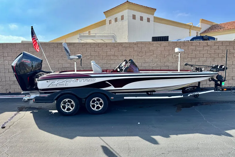 The Image of 2019 Nitro Z21 boat with Mercury Pro XS engine, parked on trailer. - 0