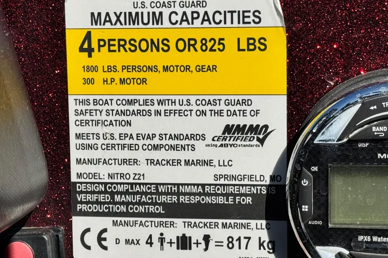 Slide: The Image of 2019 Nitro Z21 capacity label, U.S. Coast Guard certified, 4 persons or 825 lbs, 300 HP motor. - 26