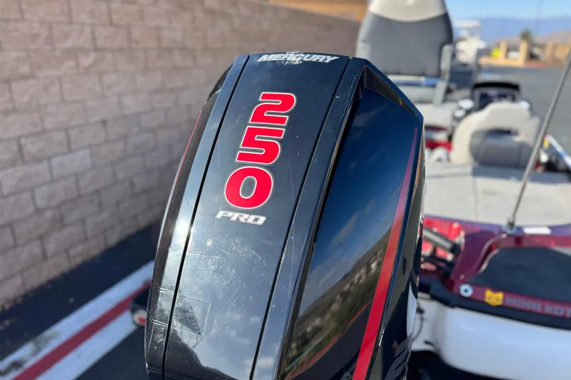 Slide: The Image of 2019 Nitro Z21 boat with Mercury 250 Pro engine, parked outdoors. - 7