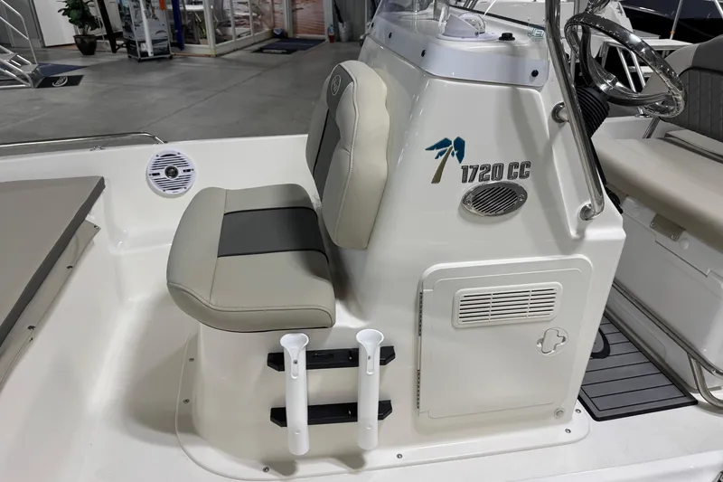 Slide: The Image of 2026 Key West 1720 Center Console boat interior with seating and console details. - 10