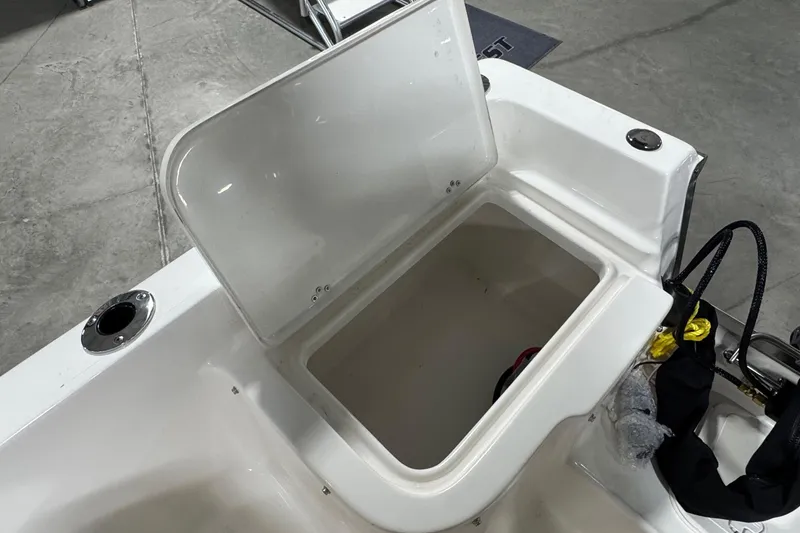 Slide: The Image of Open storage compartment on 2026 Key West 1720 Center Console boat. - 19