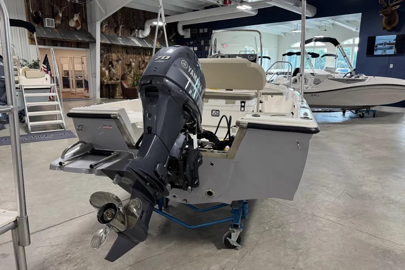 Slide: The Image of 2026 Key West 1720 Center Console boat with Yamaha engine in showroom. - 6