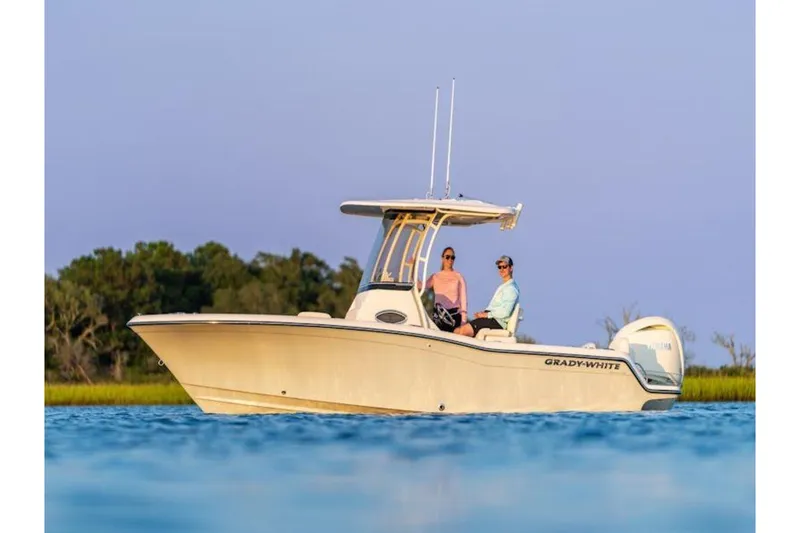 The Image of 2026 Grady-White Fisherman 216 boat on calm water with two people onboard. - 4