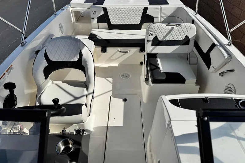Slide: The Image of 2022 Bayliner VR6 Bowrider OB interior with stylish seating and modern design. - 14