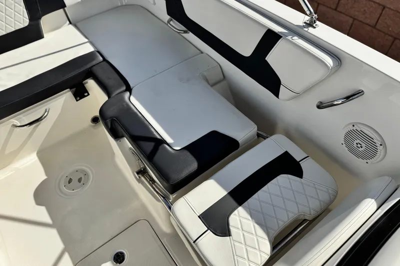 Slide: The Image of 2022 Bayliner VR6 Bowrider OB interior with stylish seating and modern design. - 18