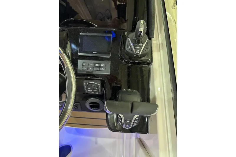 Slide: The Image of Control panel of 2026 Grady-White Express 340 boat with advanced navigation system. - 12