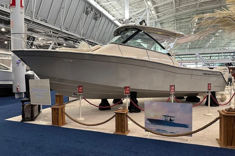 The Image of 2026 Grady-White Express 340 boat displayed at an indoor exhibition. - 2