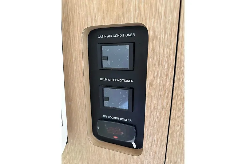 Slide: The Image of Control panel for air conditioning on 2026 Grady-White Express 340 boat. - 28