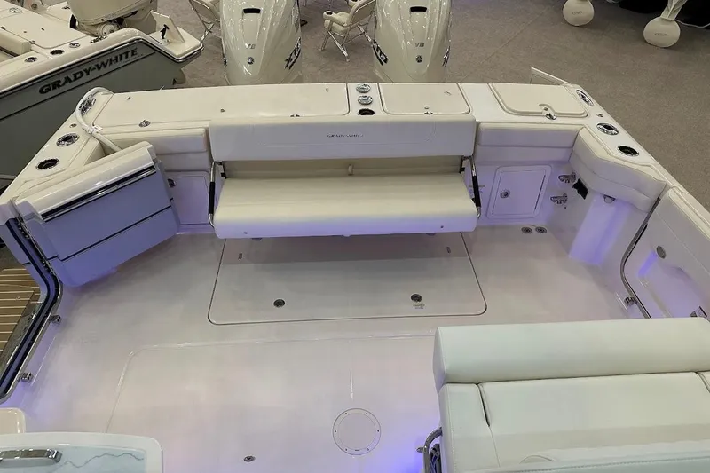 Slide: The Image of 2026 Grady-White Express 340 boat interior with seating and storage compartments. - 7