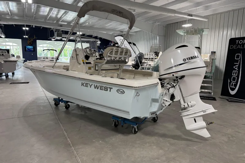 Slide: The Image of 2026 Key West 188 Bay Reef boat with Yamaha engine in showroom. - 3