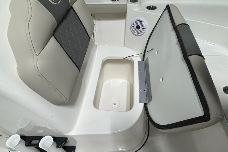 Slide: The Image of 2026 Key West 188 Bay Reef boat seat with storage compartment open. - 9