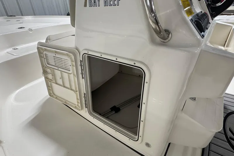 Slide: The Image of Open storage compartment on 2026 Key West 188 Bay Reef boat. - 19