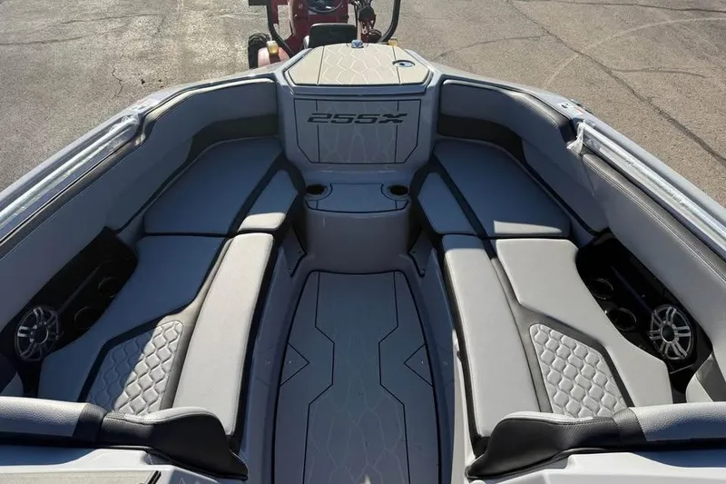 Slide: The Image of 2026 Yamaha Boats 255XD interior with sleek seating and modern design. - 10