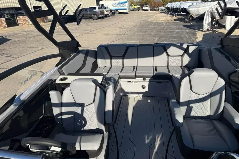 Slide: The Image of 2026 Yamaha Boats 255XD interior with modern seating and sleek design. - 11