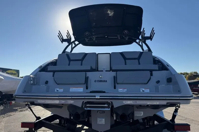 Slide: The Image of 2026 Yamaha Boats 255XD, rear view, showcasing sleek design and modern features. - 4