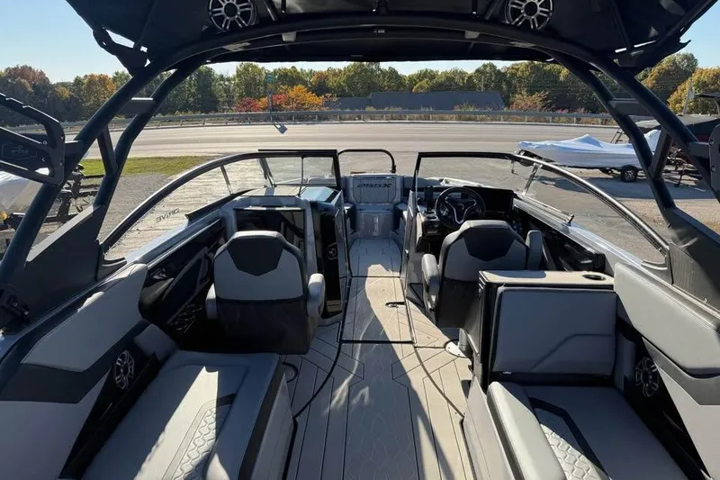 Slide: The Image of Interior view of 2026 Yamaha Boats 255XD, showcasing sleek seating and modern design. - 6