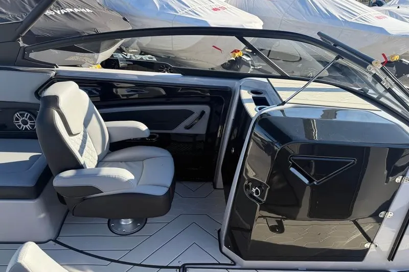 Slide: The Image of Interior of 2026 Yamaha Boats 255XD, featuring sleek seating and modern design elements. - 9
