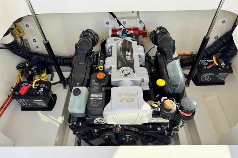 Slide: The Image of 2019 Baja 27 Outlaw engine compartment with V8 engine and dual batteries. - 17