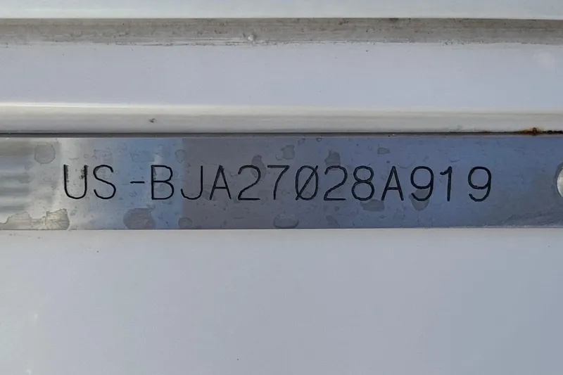 Slide: The Image of Hull identification number on a 2019 Baja 27 Outlaw boat. - 32