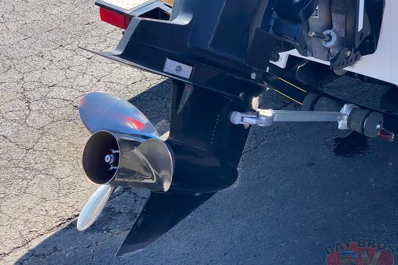 Slide: The Image of 2008 Nitro 189 Sport boat propeller and motor on asphalt surface. - 16