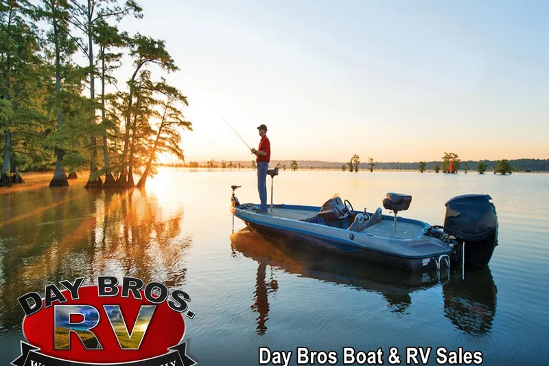Slide: The Image of Man fishing on 2008 Nitro 189 Sport boat at sunrise, Day Bros RV sales. - 22