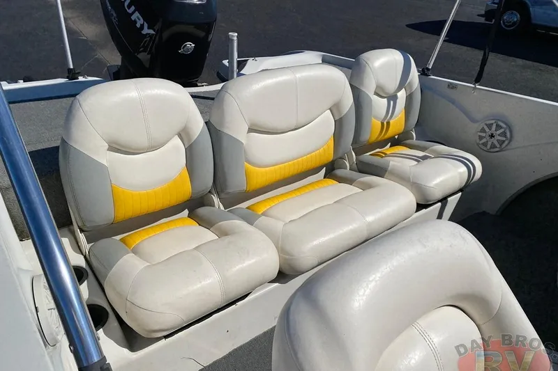 Slide: The Image of 2008 Nitro 189 Sport boat interior with white and yellow cushioned seats. - 36