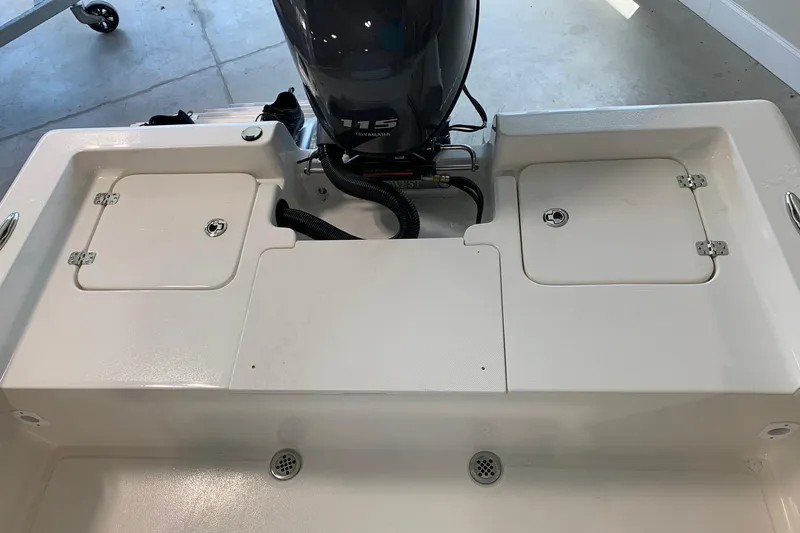 Slide: The Image of 2026 Key West 188 Bay Reef boat with Yamaha 115 engine, rear deck view. - 9