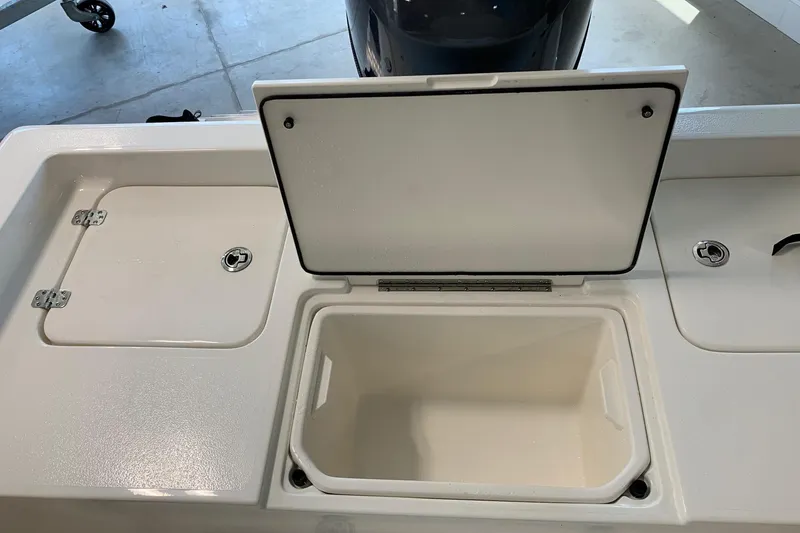 Slide: The Image of Open storage compartment on 2026 Key West 188 Bay Reef boat. - 10