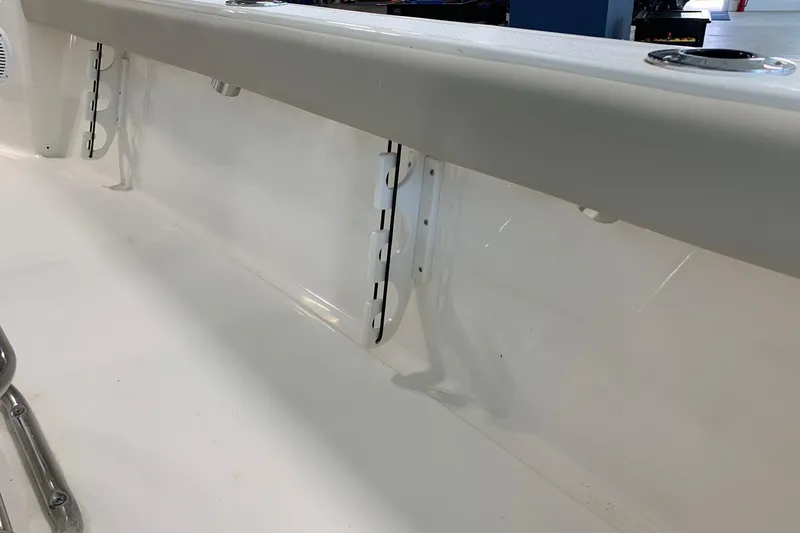 Slide: The Image of Interior view of 2026 Key West 188 Bay Reef boat, showcasing sleek white design and fixtures. - 13