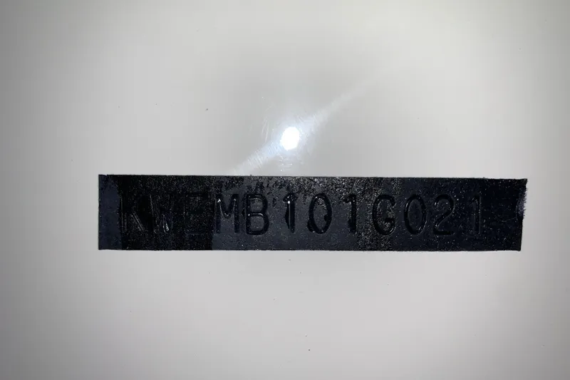 Slide: The Image of Key West 188 Bay Reef 2026 model serial number on black strip. - 24