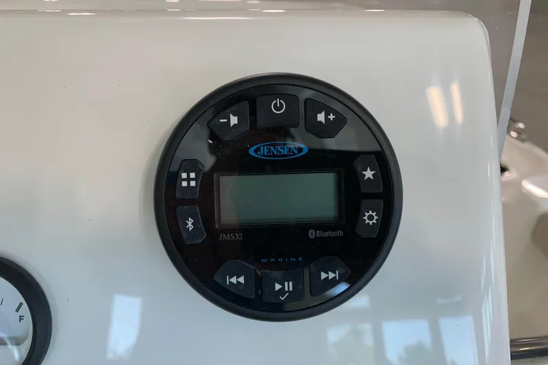 Slide: The Image of Jensen marine audio system on 2026 Key West 188 Bay Reef boat dashboard. - 8