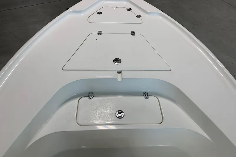 Slide: The Image of 2026 Key West 188 Bay Reef boat deck with storage compartments. - 16