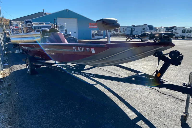 Slide: The Image of 2017 Ranger RT188 boat on trailer in outdoor storage lot. - 23